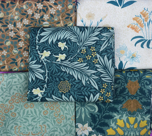 This exquisite Fat Quarter bundle features curated prints from the Kelmscott Garden collection. Inspired by the legendary designs of William Morris and the Arts and Crafts movement, these fabrics showcase intricate florals, swirling vines, and rich, nature-inspired palettes.